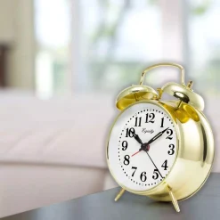 Table Clocks Equity By La Crosse Analog 4.5 In. Round Gold Metal Twin Bell Keywind Alarm Clock -Globe Sales gold equity by la crosse table clocks 13012 31 1000