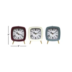 LITTON LANE Square Mauve, White And Blue Metal Table Clocks With Retractable Stands And Gold Feet (Set Of 3) -Globe Sales mauve white and blue litton lane table clocks 46420 fa 1000